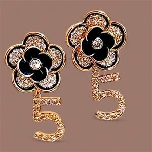 Number 5 Black and Gold Flower stud Earrings.